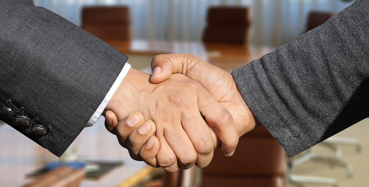 Agent and Client Shaking Hands